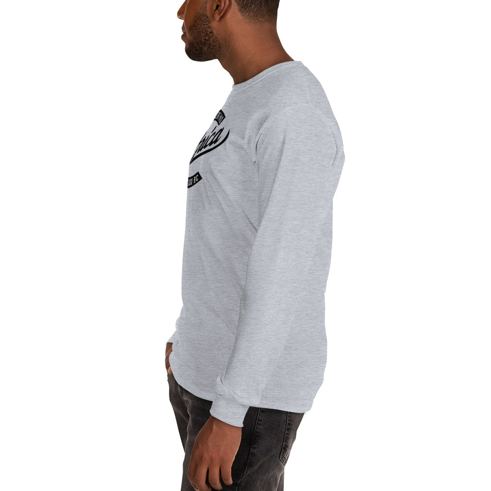 Black professional wearing African diaspora long sleeve t-shirt