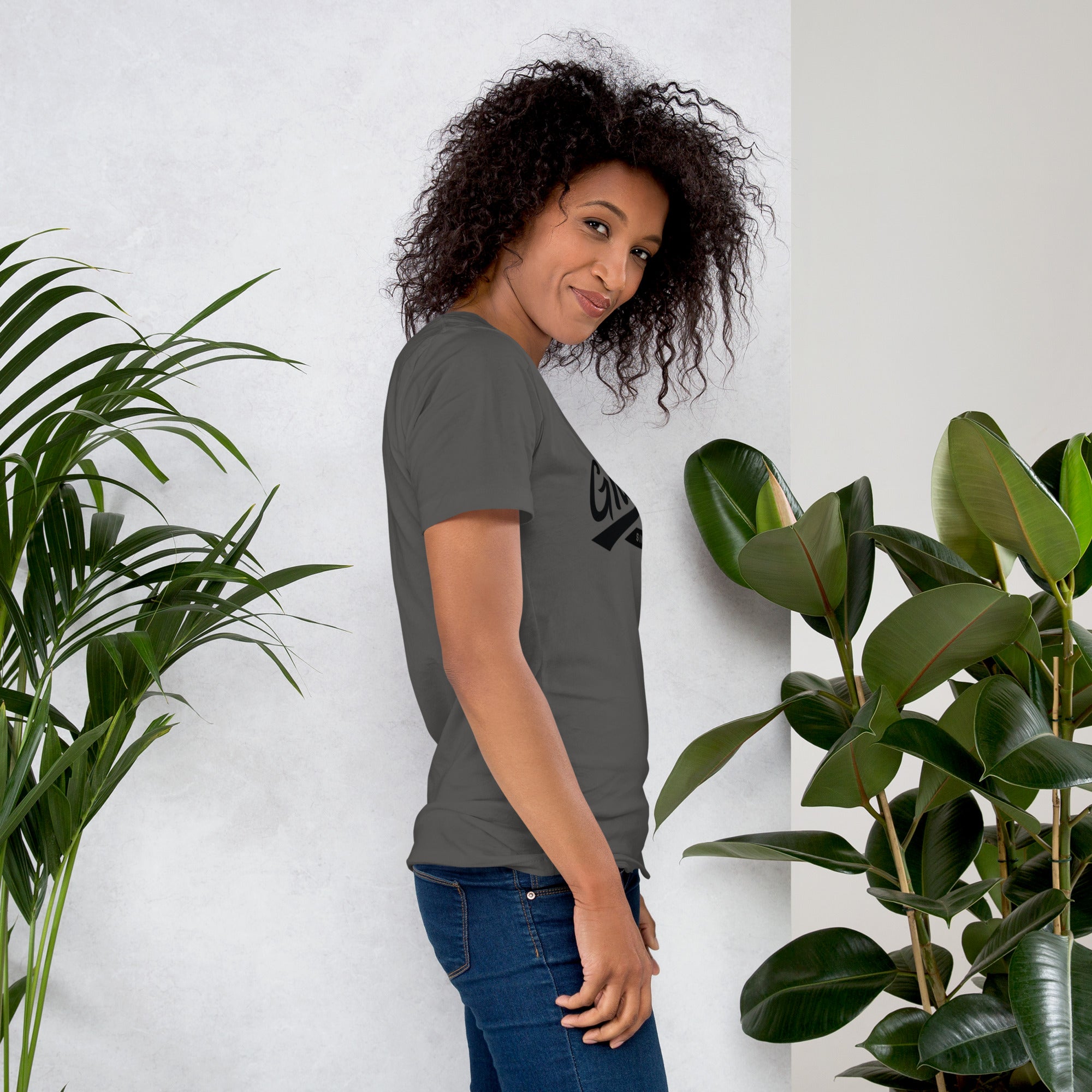 Black professional wearing African-inspired short sleeve tee