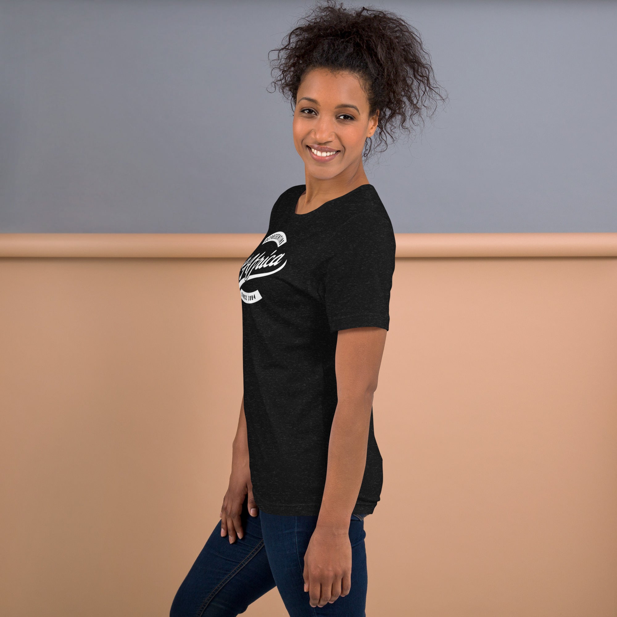 Black professional wearing African-inspired short sleeve tee