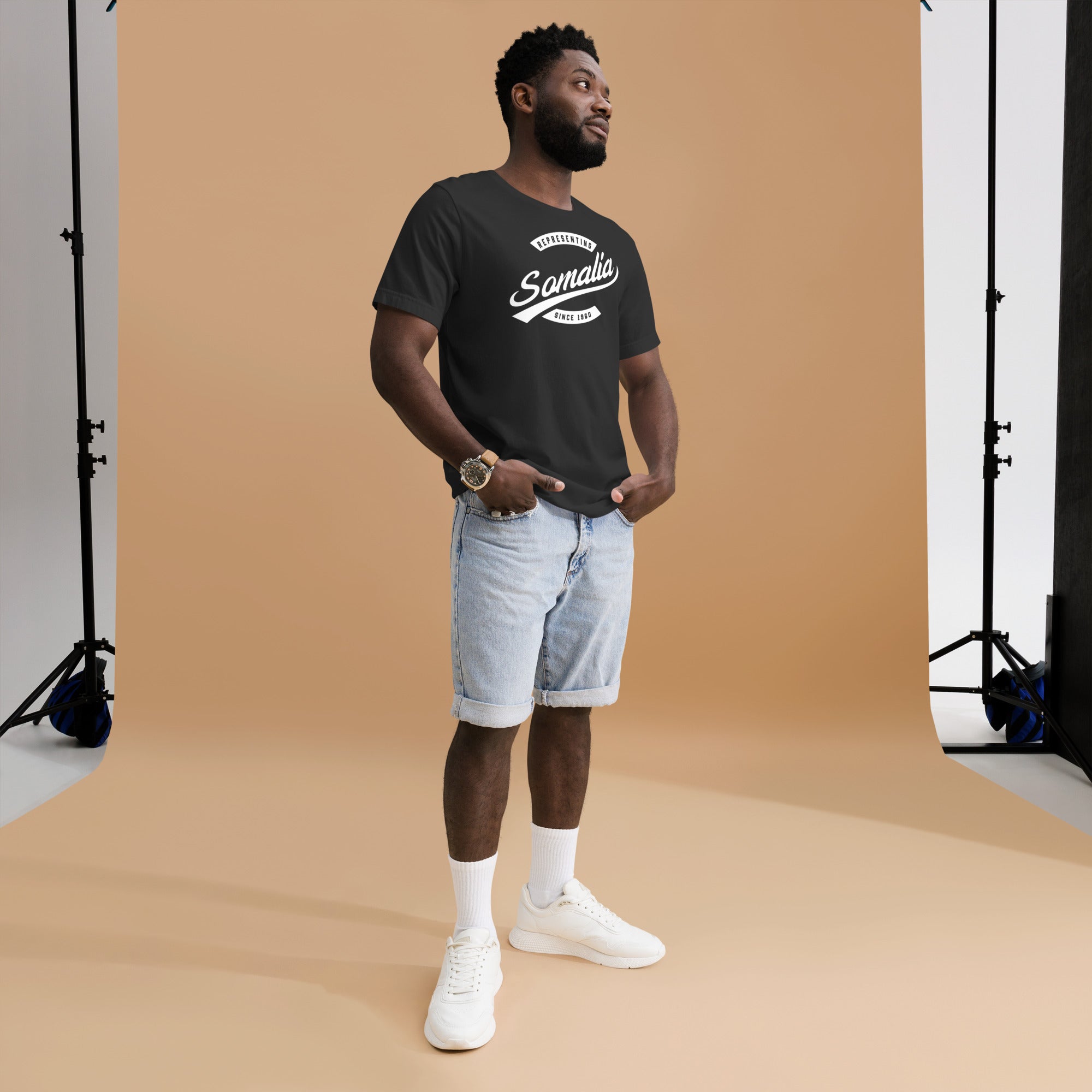 Black professional wearing African-inspired short sleeve tee