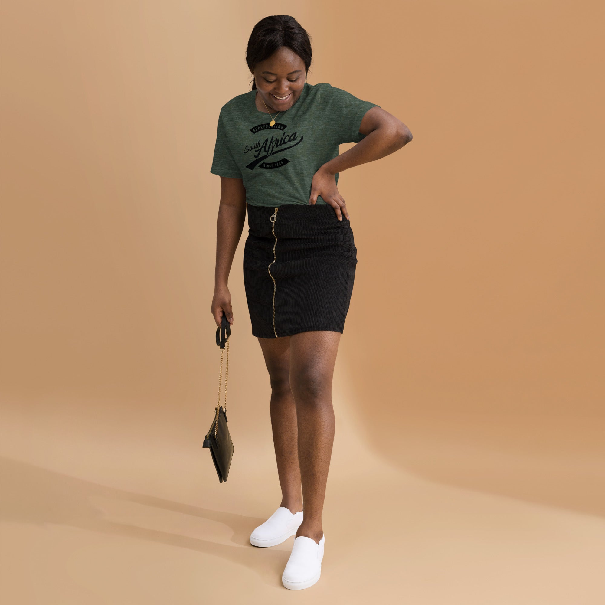 Black professional wearing African-inspired short sleeve tee