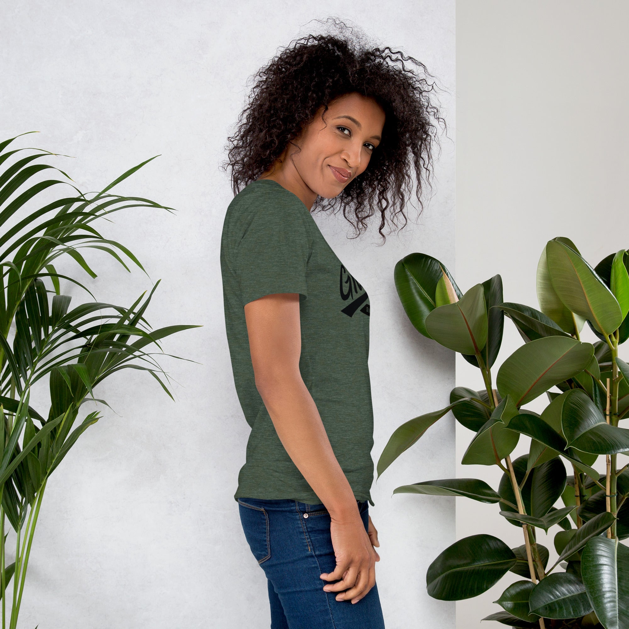 Black professional wearing African-inspired short sleeve tee