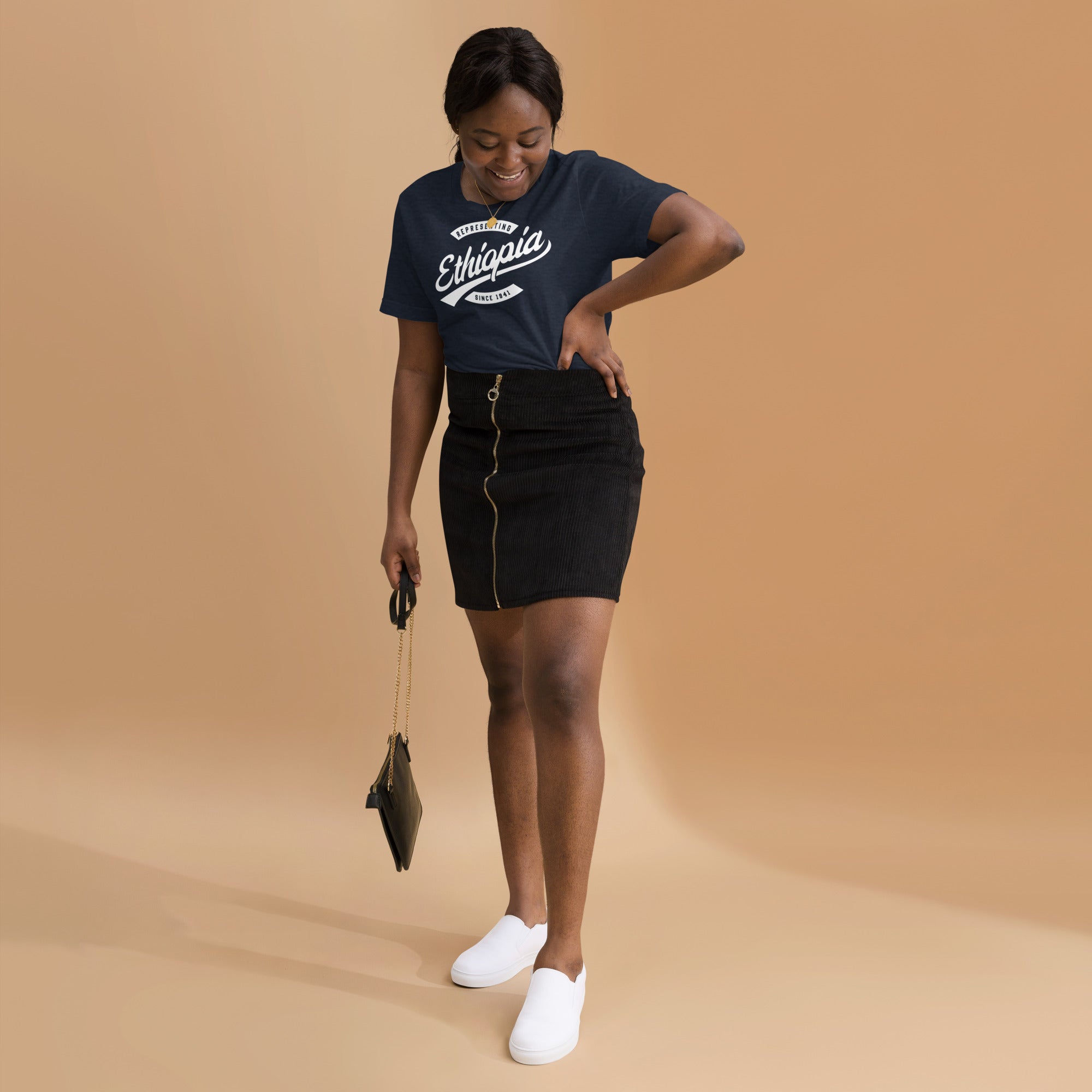 Black professional wearing African-inspired short sleeve tee