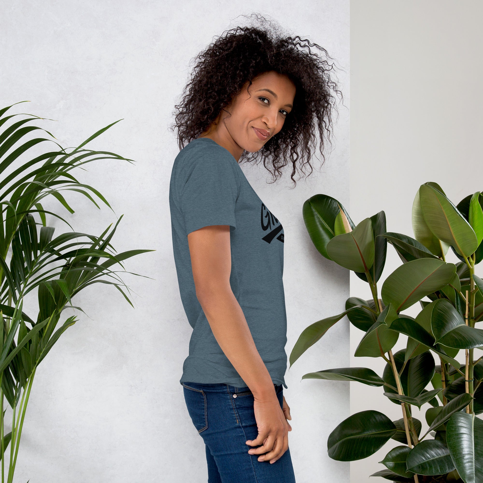 Black professional wearing African-inspired short sleeve tee