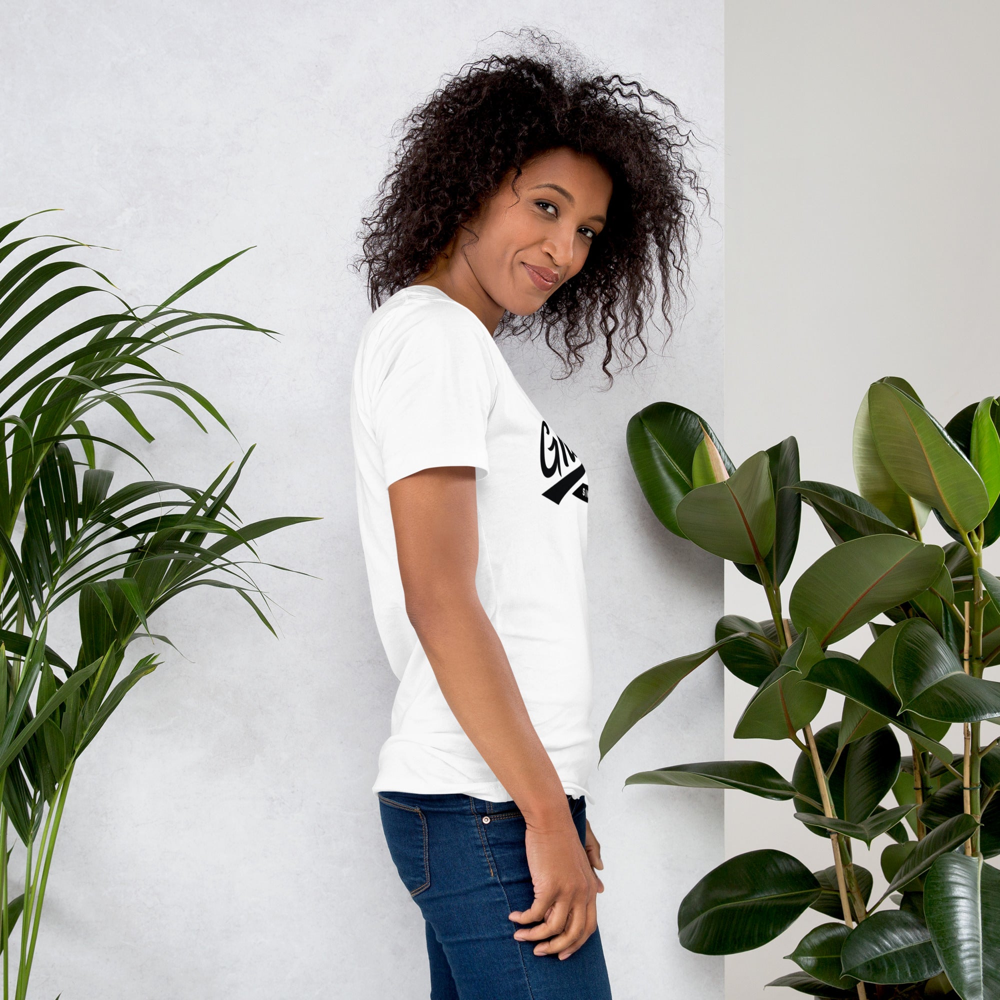 Black professional wearing African-inspired short sleeve tee